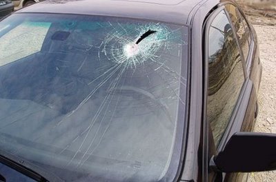 BMW windshield penetrated by piece of metal