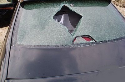 BMW windshield penetrated by piece of metal